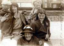 Suzi French with nephew Kenny, aunt Ann Jay, and Mary Price; c1936