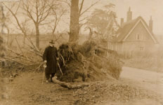 Walter Reeve in front of Church Cottages , about 1909.
