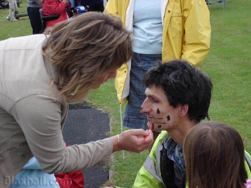 ……whilst Dan receives medical attention from Linda. Oooh nasty spots!