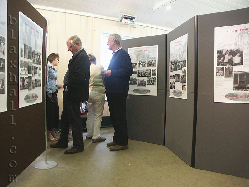 Visitors browse the display